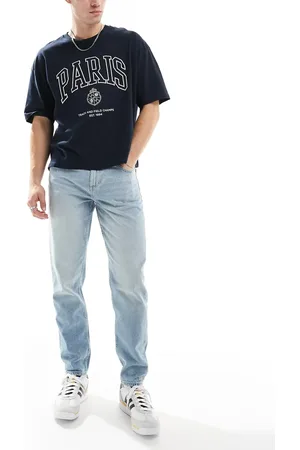 ASOS Lyse og forvaskede jeans i tapered fit-Blå