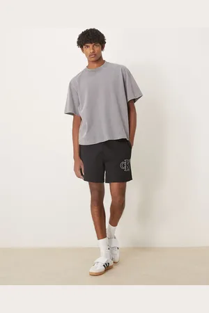 Calvin Klein Strikkede og sorte shorts med logomærke