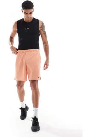 Nike Totality Dri-FIT - Abrikosfarvede strikkede 7-tommer-shorts-Orange
