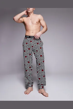 HUGO BOSS HUGO Bodywear - Tortuga - Sorte bukser med gennemgående logoprint