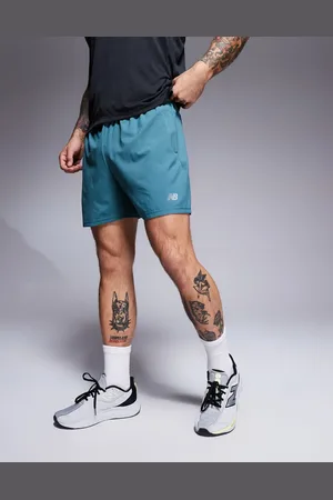 New Balance Sport Essentials - Turkisblå 5-tommer shorts