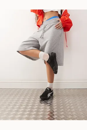 PUMA Mostro - Sorte og sølvfarvede sneakers