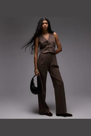 MANGO Brunt jumpsuit med høj hals og bælte