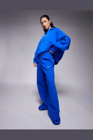 Nike Phoenix - Blå joggingbukser med høj talje og vide ben i fleece