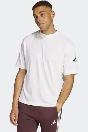 adidas Essentials - Løstsiddende hvid T-shirt med 3-stribet sort logo