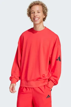 adidas Essentials - Løstsiddende rød sweatshirt med sort logo