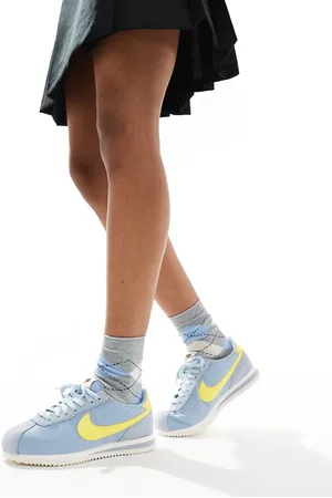 Nike Cortez TXT - og gule sneakers i ruskind
