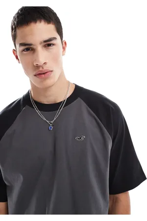 Hollister Cremehvid/ raglan-T-shirt med ikonlogo og kontrasterende kanter i firkantet pasform-Neutral