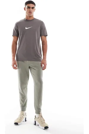 Nike Primary Dri-FIT - Grå joggingbukser-Grøn