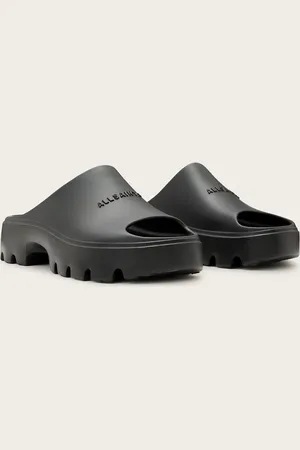 AllSaints Eclipse - Sorte flatform-sandaler i gummi