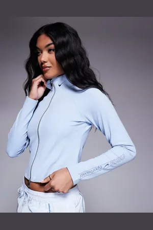 Nike Gym Life Swoosh - Lyseblå træningsjakke med lange ærmer og gennemgående lynlås