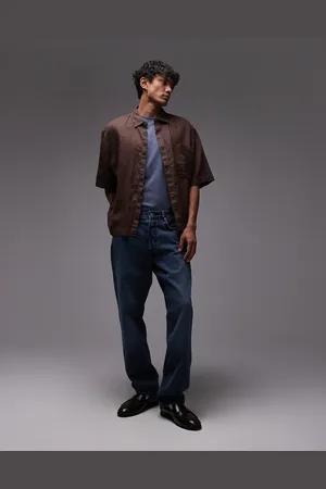 ARKET Mist - Blå posede jeans med lav talje og vide ben i lys ældet vask