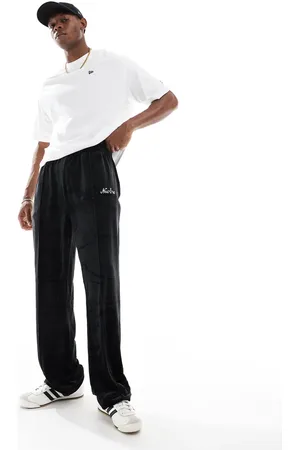 New Era Sorte joggingbukser med lige ben og tekstlogo i velour - Del af sæt