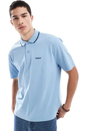 Hollister Lyseblå polotop med kontrasteredne kravekant og logodetalje