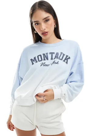 Hollister Blå sweatshirt med rund hals og grafik foran