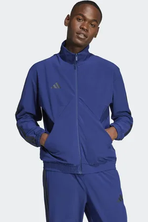 adidas House of Tiro - Mørkeblå vævet træningsoverdel med sorte logodetaljer
