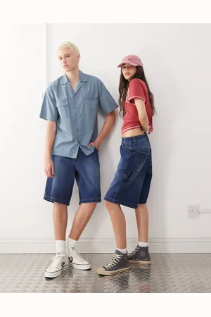 Reclaimed Unisex - Denimshorts i blå vask med skatersnit