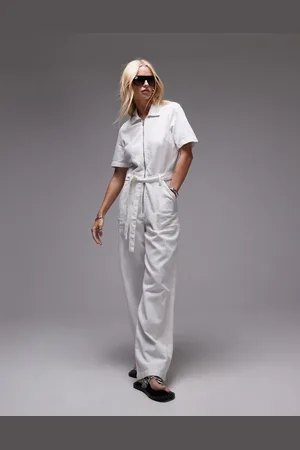 MANGO Afslappet jumpsuit i denim med lynlås