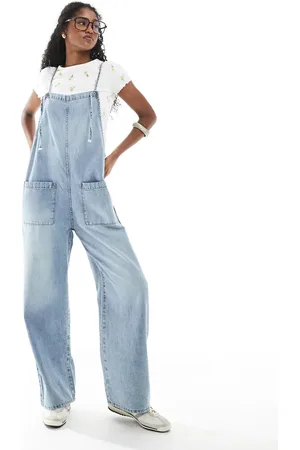Monki Forvaskede overalls i denim med bindedetaljer