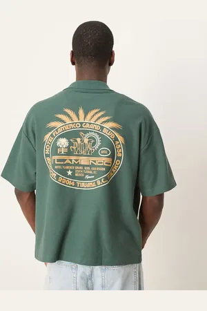 ASOS Grøn oversized polo med vaffeltekstur og palmegrafik i kraftigt stof på 230 gsm i firkantet pasform