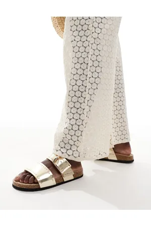 ASOS Fallon - Guldfarvede sandaler med sål og nitter
