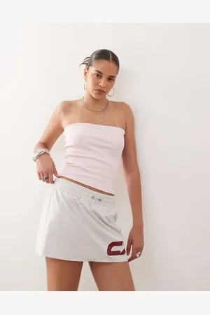 COLLUSION Lyserød ribstrikket bandeau-top i jersey