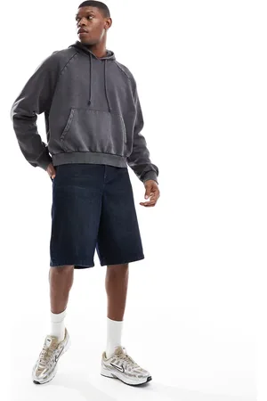 ASOS Lange denimjorts i blå mellemvask
