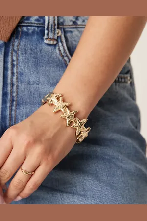 Accessorize Guldfarvet statement-armring med søstjernevedhæng