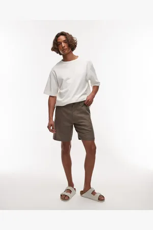ARKET Gråbrune shorts med fladt design foran og skrå lommer i hør