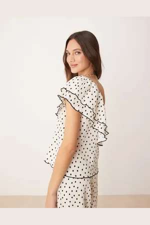 Y.A.S Cremehvid oneshoulder-top med flæser og sorte polkaprikker - Del af sæt