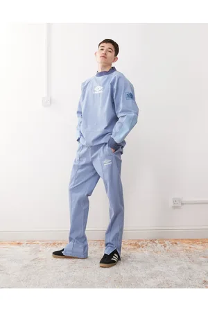 Umbro Drill - Blå bukser med broderet logo