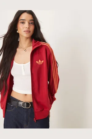 adidas Firebird - Rød løstsiddende træningsjakke med orange detaljer