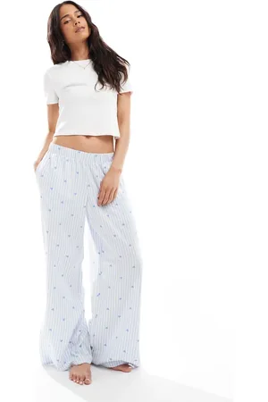Hollister Nattøj - Blå og posede flannel-bukser med mellemhøj talje, hjerteprint og logo-taljebånd