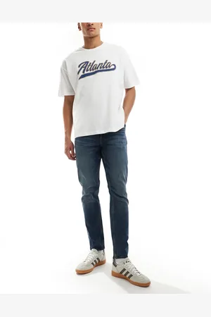 ASOS Blå jeans i mørk vask med vintage-skær i slim fit