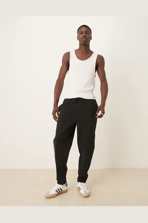 ASOS Sorte joggingbukser i dobbeltsidet stof med indsnævrede ben og pintucks