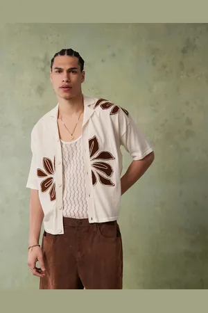 ASOS Ecrufarvet afslappet strikket polo med knapper og blomsterbroderi-Blå