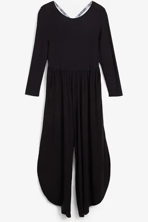 bonprix Urheilujumpsuit takaa avaralla pääntiellä, leveät lahkeet