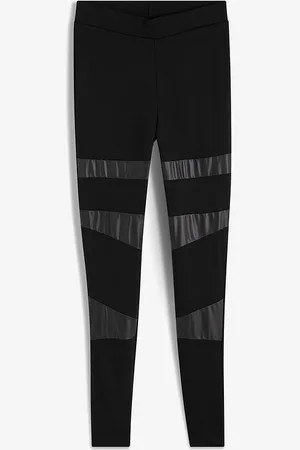 bonprix Leggingsit tekonahkakappaleilla