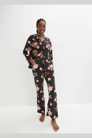 bonprix Pyjama nappilistalla ja sivutaskuilla