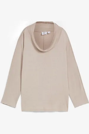 bonprix Paita 3/4-hihoilla ja takaosan halkiolla