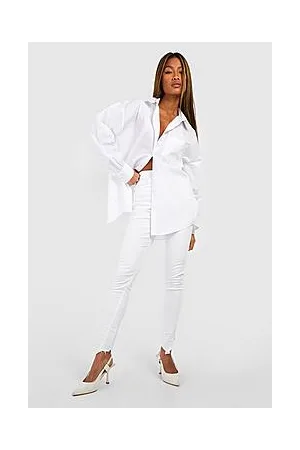 Boohoo Distressed Asymmetric Hem Skinny Jeans