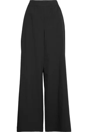 Moschino Naiset Housut - Trousers Leveälahkeiset Housut Musta