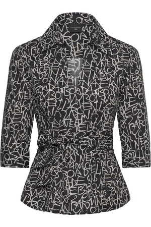Andiata Kiira Designers Blouses Short-sleeved Black