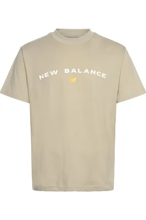 New Balance Reimagined Graphic T-Shirt 1 Sport Men Sports Clothes Sport Tops Sport T-shirts Beige