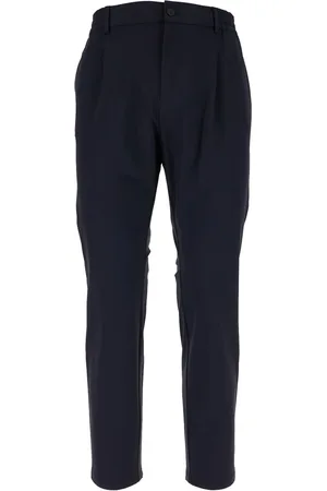 CRUNA Pleated trousers