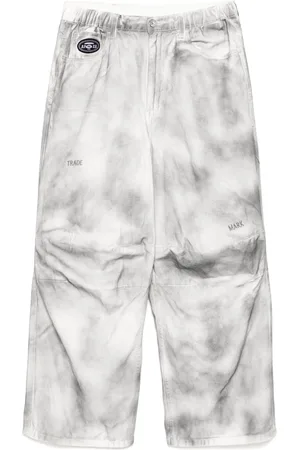 A Bathing Ape Washed-effect jeans