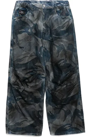 A Bathing Ape Moonface-logo washed camo jeans