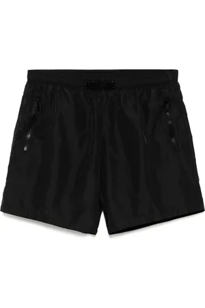 Moschino Zip fastening pockets swim shorts