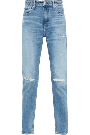 Calvin Klein Distressed tapered-leg jeans