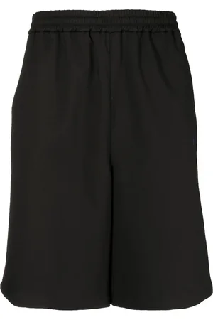 OFF-WHITE Monogram band track shorts